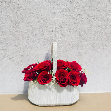 Red roses in white Basket